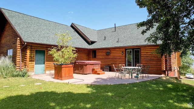 485 S Woodland Hills Dr, Woodland Hills, UT 84653 - back of property featuring a hot tub, log exterior, a patio area, and a lawn