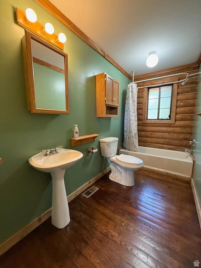485 S Woodland Hills Dr, Woodland Hills, UT 84653 - bathroom with toilet, shower / bath combo, baseboards, wood finished floors, and rustic walls