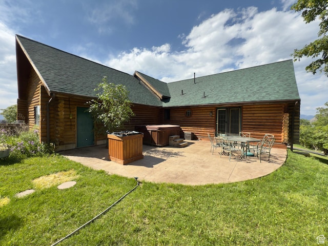 485 S Woodland Hills Dr, Woodland Hills, UT 84653 - back of property featuring a hot tub, a patio area, a yard, roof with shingles, and log exterior