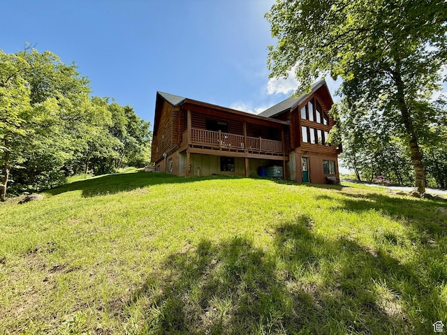 485 S Woodland Hills Dr, Woodland Hills, UT 84653 - rear view of property with a yard, a deck, and log veneer siding