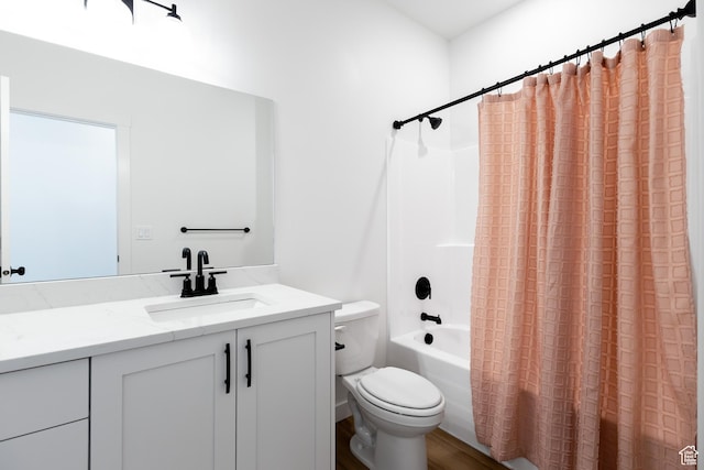 684 S 3550 W Unit 131, West Weber, UT 84401 - full bathroom with shower / bath combo, toilet, vanity, and wood finished floors