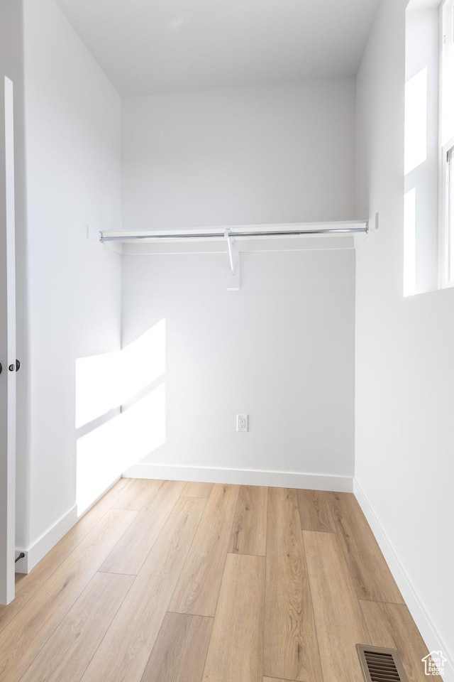 684 S 3550 W Unit 131, West Weber, UT 84401 - walk in closet with wood finished floors