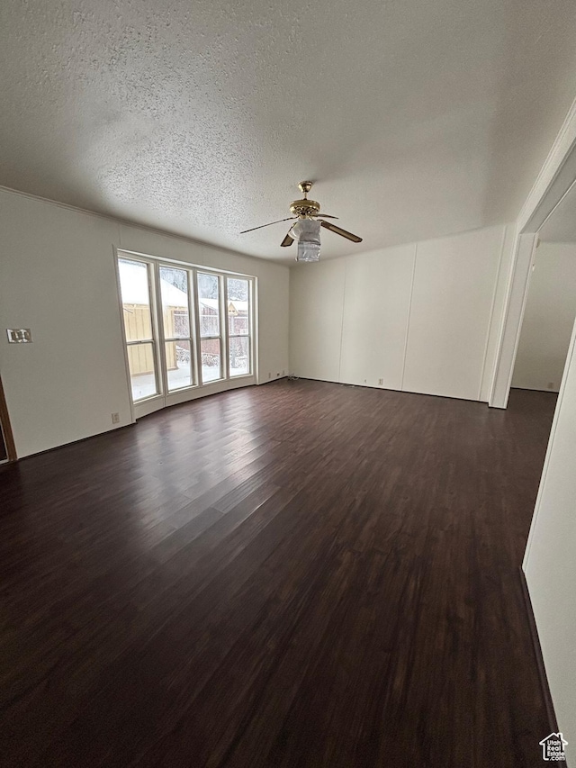 260 S 300 E, Heber City, UT 84032 - unfurnished living room featuring dark wood-type flooring, ceiling fan, and a textured ceiling