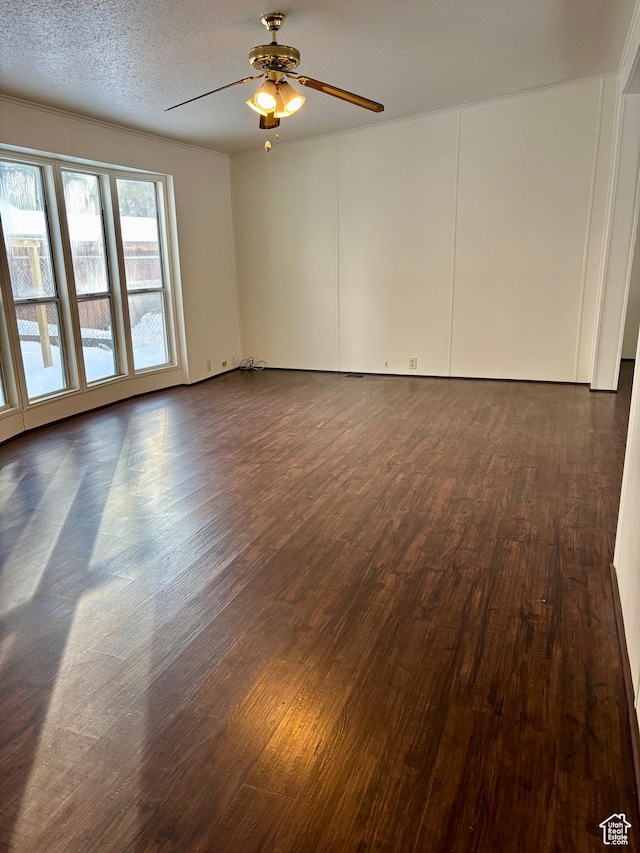260 S 300 E, Heber City, UT 84032 - spare room with a textured ceiling, a ceiling fan, and dark wood finished floors