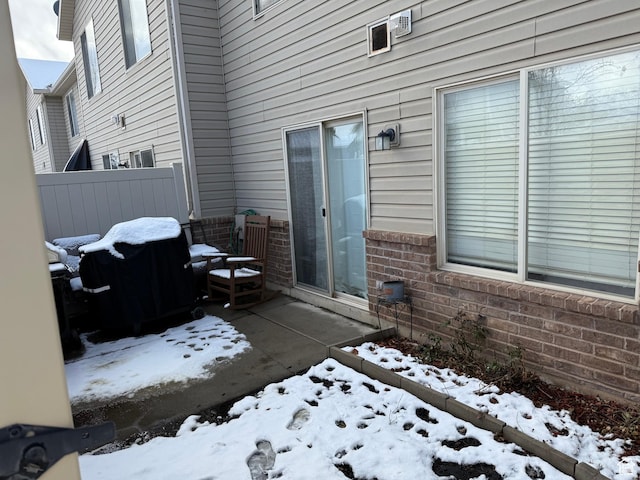 2044 N Evans Cove Loop W, Layton, UT 84041 - snow covered patio with fence
