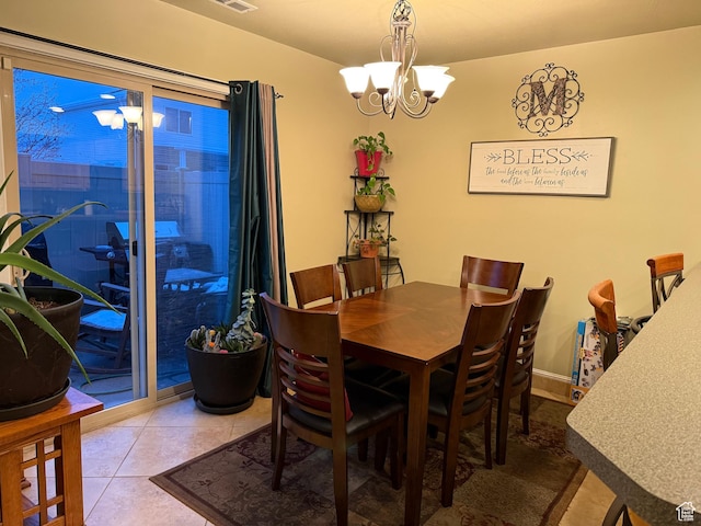 2044 N Evans Cove Loop W, Layton, UT 84041 - dining room with an inviting chandelier, tile patterned floors, baseboards, and visible vents