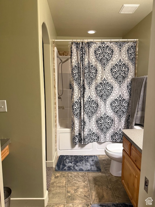 2044 N Evans Cove Loop W, Layton, UT 84041 - bathroom featuring visible vents, shower / bath combo, toilet, and vanity