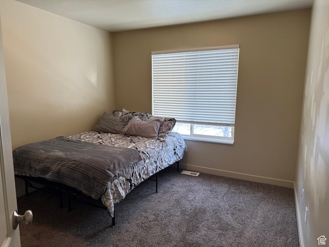 2044 N Evans Cove Loop W, Layton, UT 84041 - carpeted bedroom with baseboards and visible vents