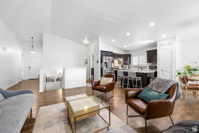5171 W Dartford Way, West Valley City, UT 84120 - living room featuring hardwood / wood-style floors and high vaulted ceiling