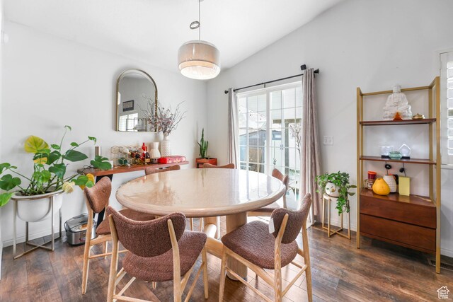 5171 W Dartford Way, West Valley City, UT 84120 - dining space with vaulted ceiling and dark hardwood / wood-style floors