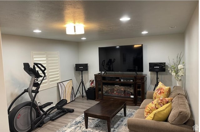 5171 W Dartford Way, West Valley City, UT 84120 - workout area featuring a textured ceiling and light wood-type flooring
