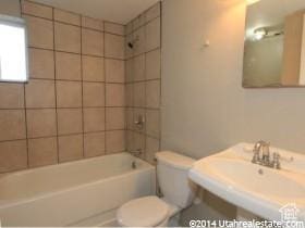 4548 W 4695 S, West Valley City, UT 84120 - full bath featuring shower / bath combination, a sink, and toilet