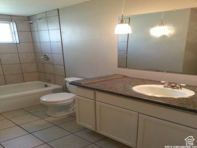 4548 W 4695 S, West Valley City, UT 84120 - full bathroom with toilet, vanity, tub / shower combination, and tile patterned floors