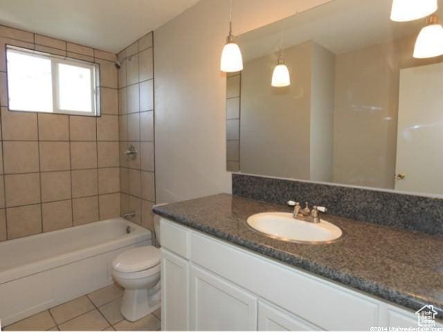 4548 W 4695 S, West Valley City, UT 84120 - full bath featuring toilet, tile patterned floors, vanity, and shower / bathtub combination