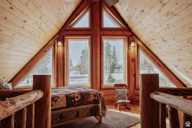 bedroom featuring wood finished floors, wooden ceiling, and lofted ceiling
