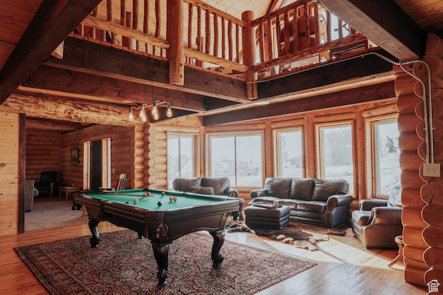 playroom with log walls, billiards, a high ceiling, and wood finished floors