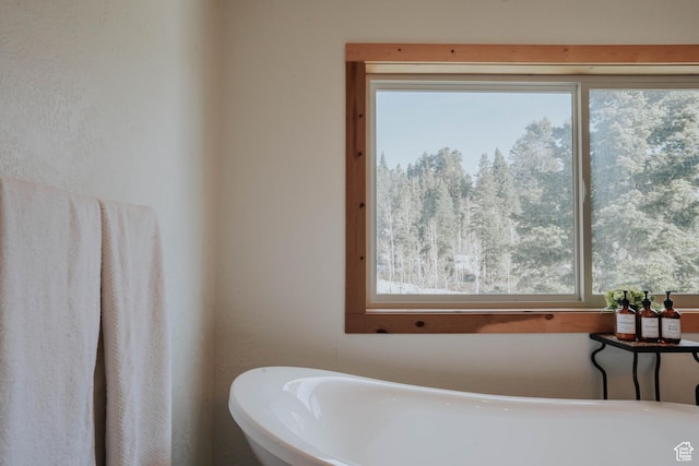 full bath with a soaking tub