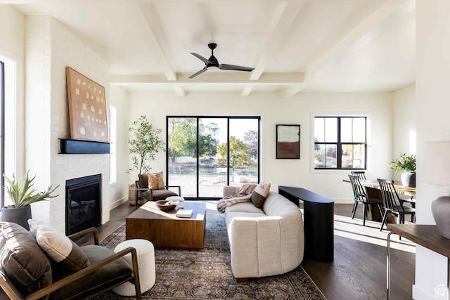 1318 Mahogany Way, Park City, UT 84098 - living room with beamed ceiling, dark wood-type flooring, a wealth of natural light, and a fireplace