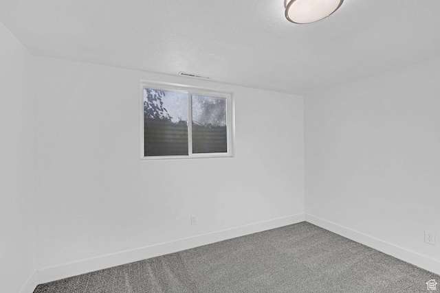 empty room featuring carpet