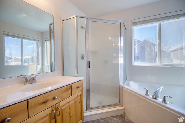 1247 S Alpine Dr, Saratoga Springs, UT 84045 - bathroom with vanity, a shower stall, and a garden tub