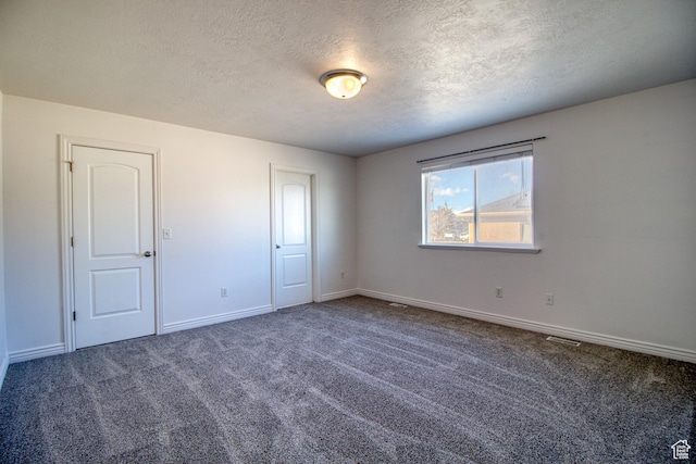 1247 S Alpine Dr, Saratoga Springs, UT 84045 - unfurnished bedroom with carpet floors, a textured ceiling, and baseboards