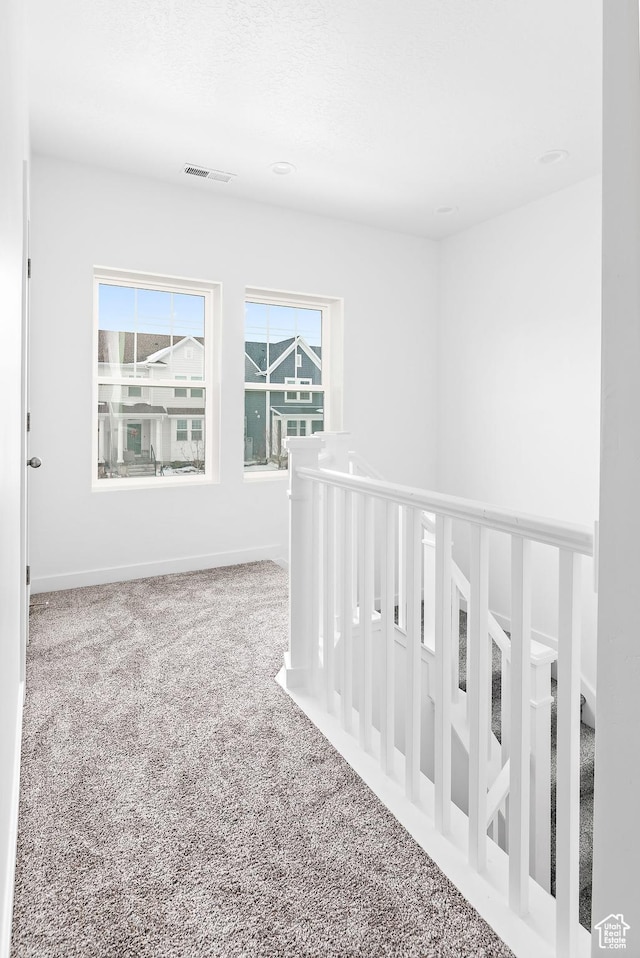 11283 S Willow Walk Dr W, South Jordan, UT 84009 - carpeted empty room with healthy amount of natural light and baseboards