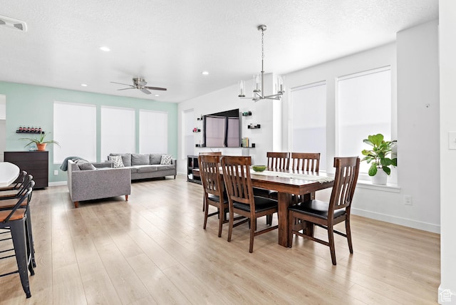 11283 S Willow Walk Dr W, South Jordan, UT 84009 - dining room with ceiling fan, light wood-style flooring, baseboards, recessed lighting, and a chandelier