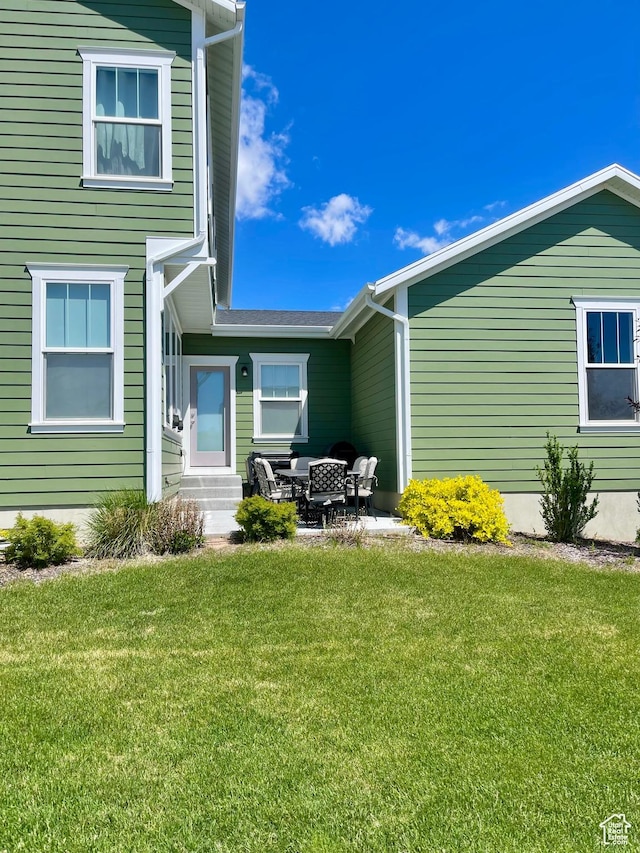 11283 S Willow Walk Dr W, South Jordan, UT 84009 - back of house with entry steps and a yard