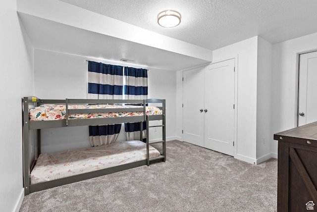 11283 S Willow Walk Dr W, South Jordan, UT 84009 - carpeted bedroom featuring baseboards and a textured ceiling