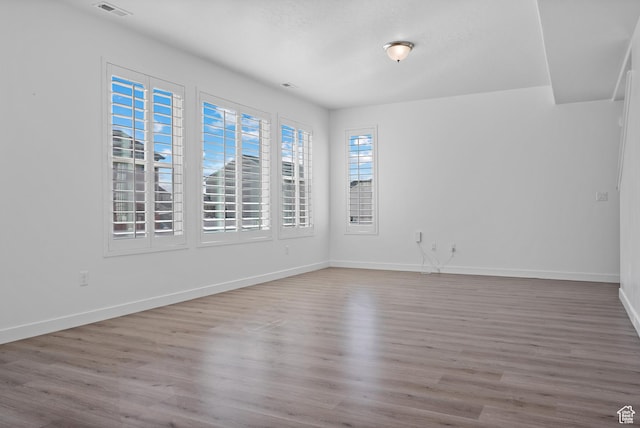 621 W 950 S, Springville, UT 84663 - empty room with wood finished floors, visible vents, and baseboards