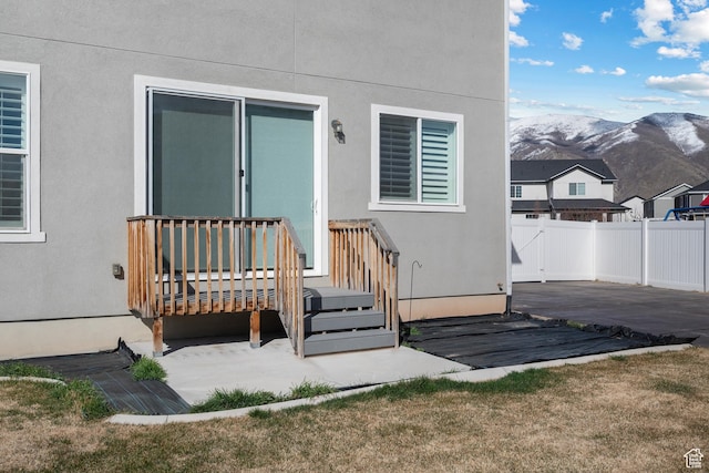 621 W 950 S, Springville, UT 84663 - entrance to property with stucco siding, a mountain view, a patio, and fence
