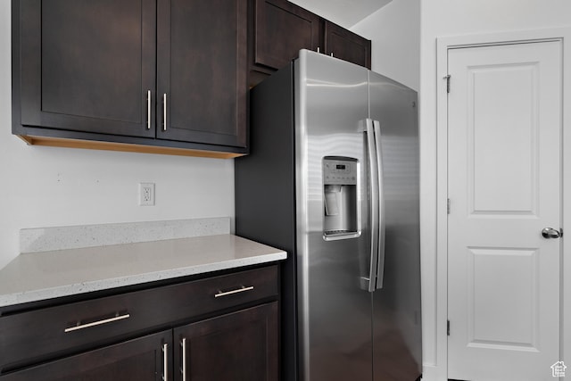 621 W 950 S, Springville, UT 84663 - kitchen with dark brown cabinetry, light stone countertops, and stainless steel refrigerator with ice dispenser