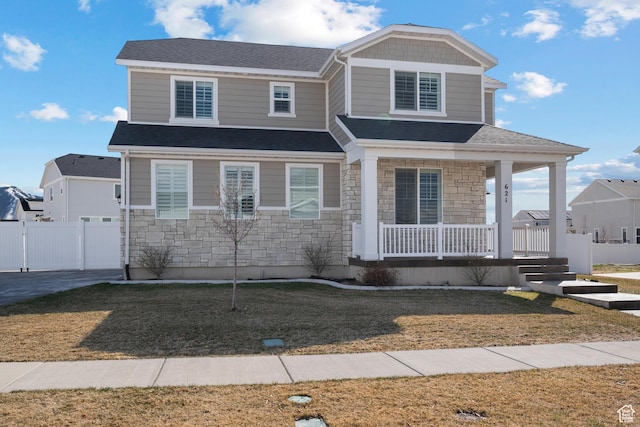 621 W 950 S, Springville, UT 84663 - view of front of home featuring stone siding, a porch, and a front yard