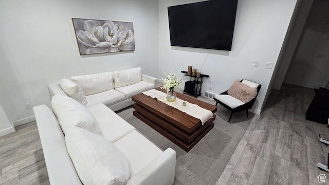 5343 W Big Sur Dr, South Jordan, UT 84009 - living area with light wood-style floors, visible vents, and baseboards