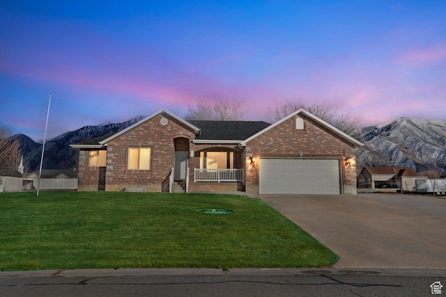 877 S 200 W, Mona, UT 84645 - ranch-style house with a garage, a yard, and a mountain view
