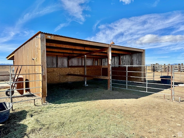 view of outbuilding featuring an outdoor structure and an exterior structure