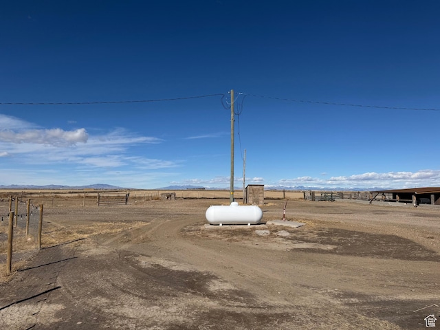 exterior space featuring a rural view and a mountain view