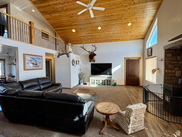 living area featuring wooden ceiling, high vaulted ceiling, recessed lighting, and ceiling fan