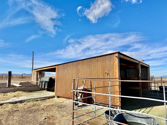 view of outbuilding featuring an outbuilding and an exterior structure