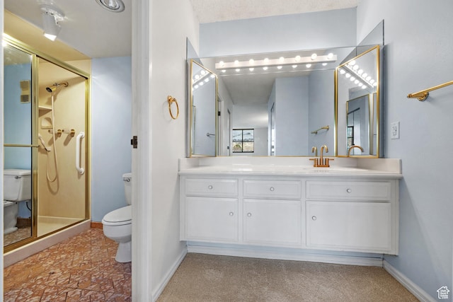 241 N Vine St W Unit 1101E, Salt Lake City, UT 84103 - bathroom featuring toilet, vanity, and a shower with shower door