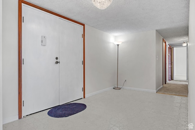 241 N Vine St W Unit 1101E, Salt Lake City, UT 84103 - foyer entrance featuring a textured ceiling