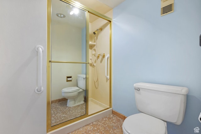 241 N Vine St W Unit 1101E, Salt Lake City, UT 84103 - bathroom featuring toilet and a shower with door