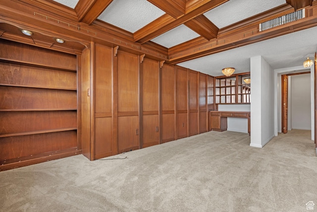 241 N Vine St W Unit 1101E, Salt Lake City, UT 84103 - interior space featuring coffered ceiling, wooden walls, built in desk, and beam ceiling
