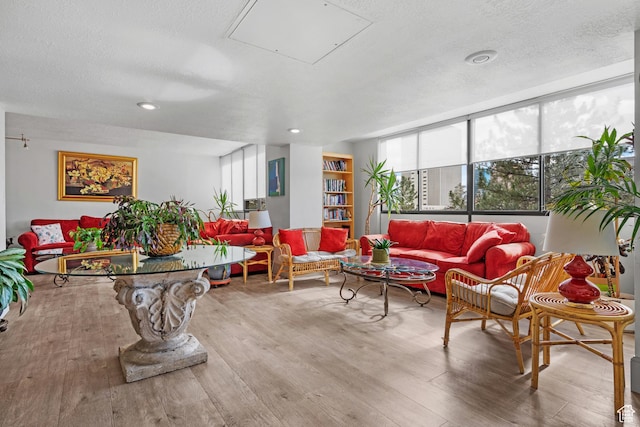 241 N Vine St W Unit 1101E, Salt Lake City, UT 84103 - living room featuring hardwood / wood-style flooring and a textured ceiling