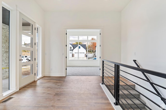 434 W 450 S Unit 815, Farmington, UT 84025 - hallway with plenty of natural light, wood-type flooring, and an upstairs landing