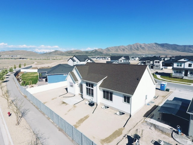 5523 N Honey Suckle Way, Eagle Mountain, UT 84005 - aerial view of residential area featuring a mountainous background
