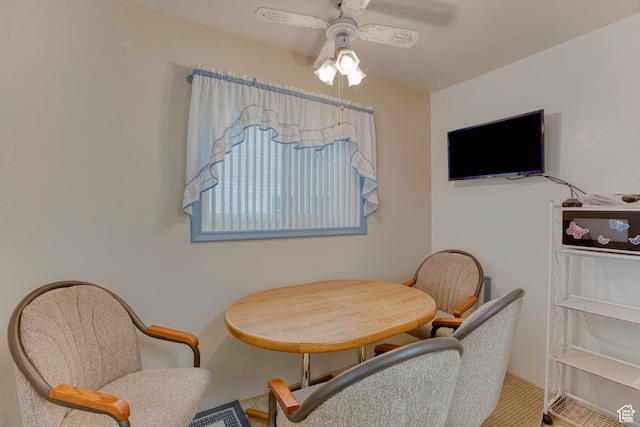 dining space with ceiling fan