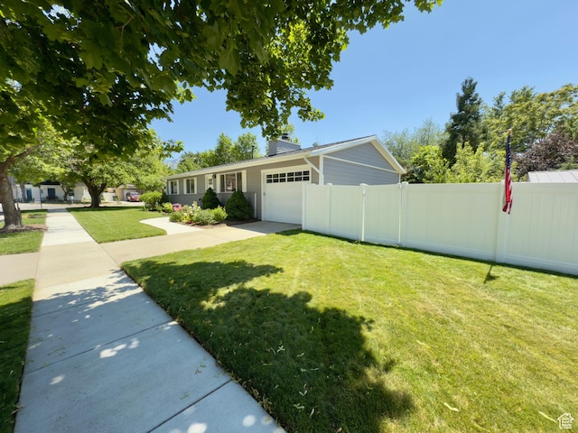 1460 E Amalfi Ave, Sandy, UT 84093 - view of front of house with a garage, concrete driveway, and a chimney