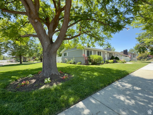 1460 E Amalfi Ave, Sandy, UT 84093 - ranch-style home featuring a front lawn and brick siding