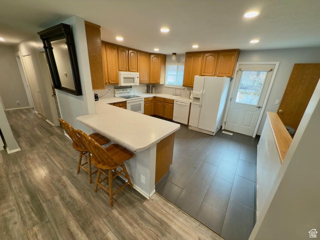 1460 E Amalfi Ave, Sandy, UT 84093 - kitchen with white appliances, a sink, dark wood-style flooring, recessed lighting, and light countertops